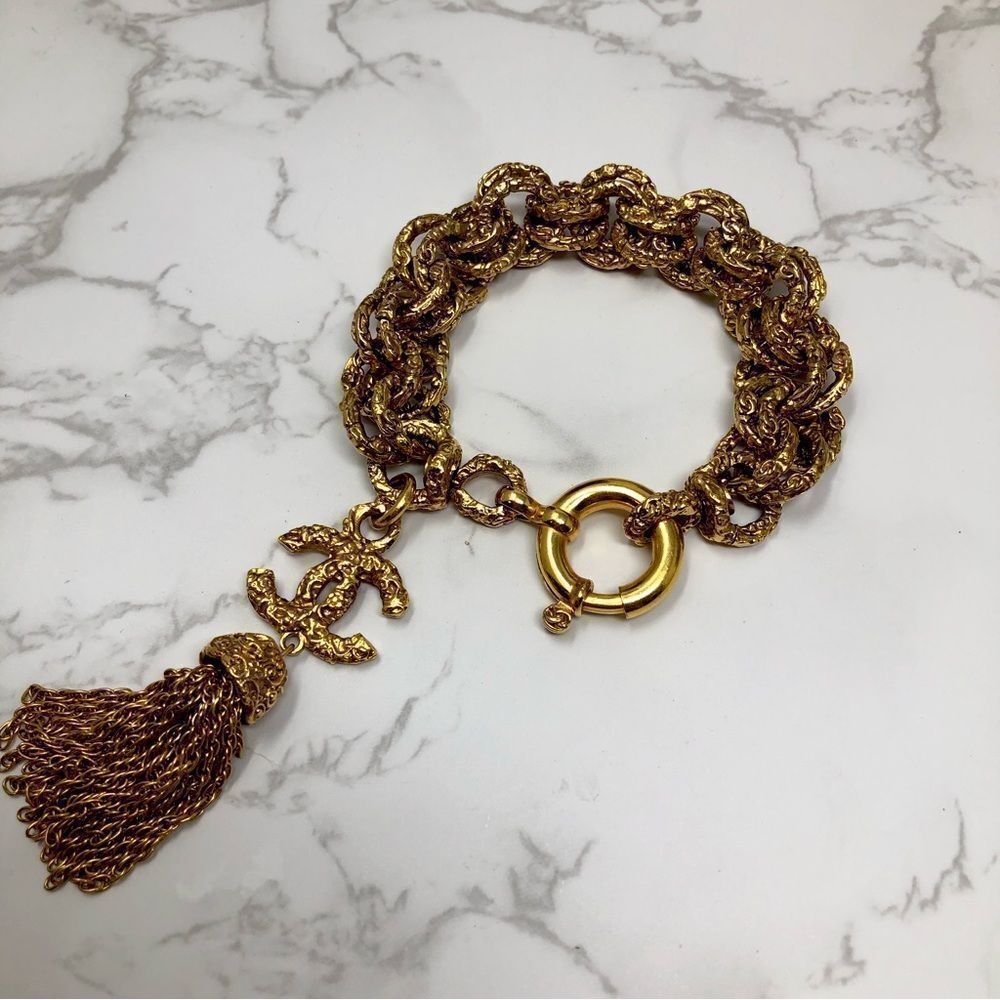 Chanel CC Lava 93A Tassel Textured Bracelet Gold tone